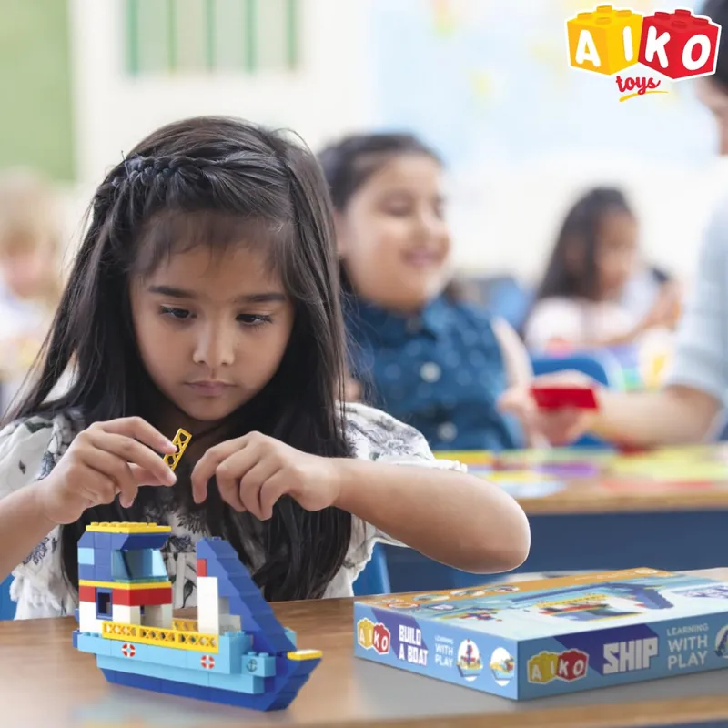 NiraToys Aiko Build a Boat Girl Building Ship with Blocks in Classroom Learning with Play